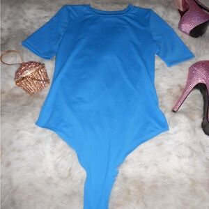 Blue short sleeve thong bodysuit with clasps